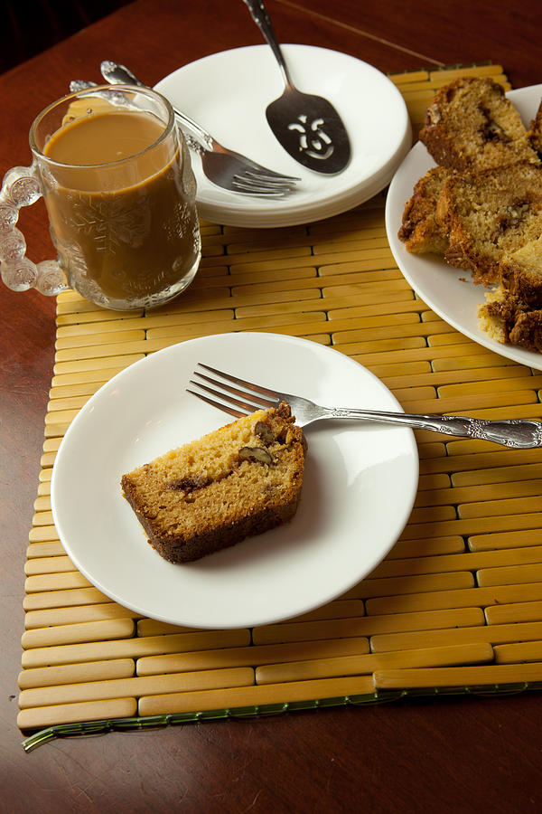 Slices of sweet bread with a cup of coffee Photograph by Kyle Lee