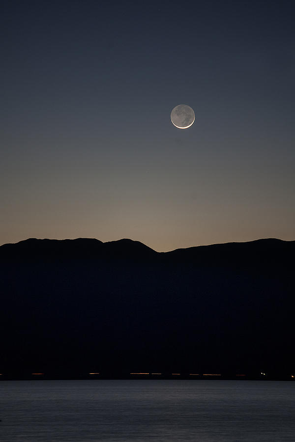 Sliver Moon over the Salton Sea Photograph by Peter Tellone