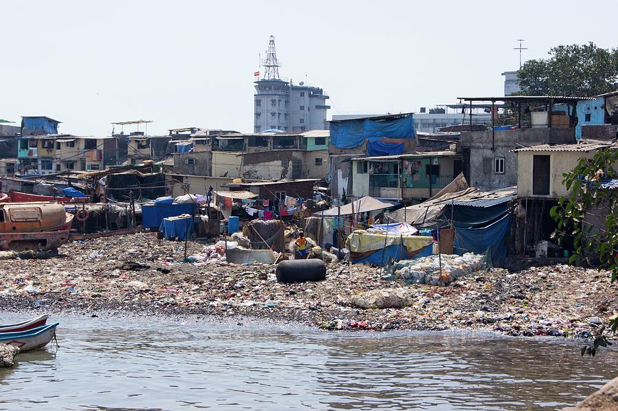 Boat Photograph - Slum In Colaba by Mark Williamson