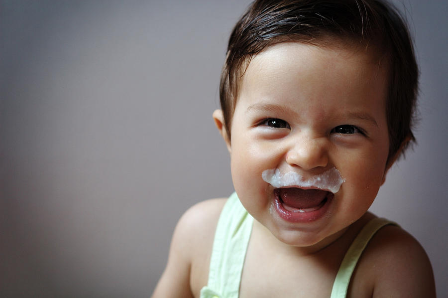 Small boy smiling with  milk moustache Photograph by Slavina