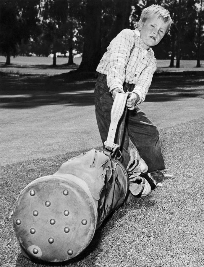 Small Boy Totes Heavy Golf Bag Photograph by Underwood Archives