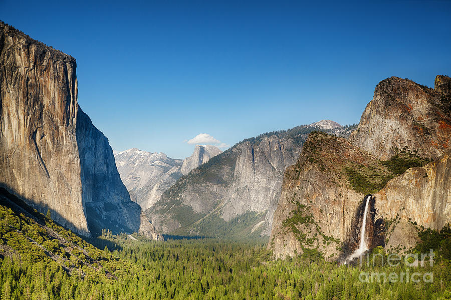 Yosemite National Park Photograph - Small clouds over the Half Dome by Jane Rix