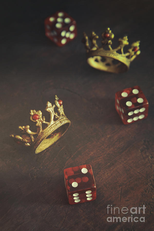 Small crowns with dice on table Photograph by Sandra Cunningham