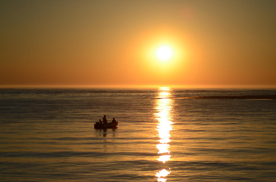Small Fishing Boat at Sunrise Photograph by Bill Cannon