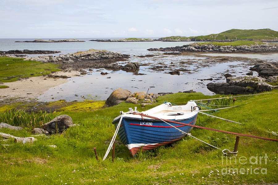 Small fishing boat on the east coast of Barra Outer Hebrides Scotland ...