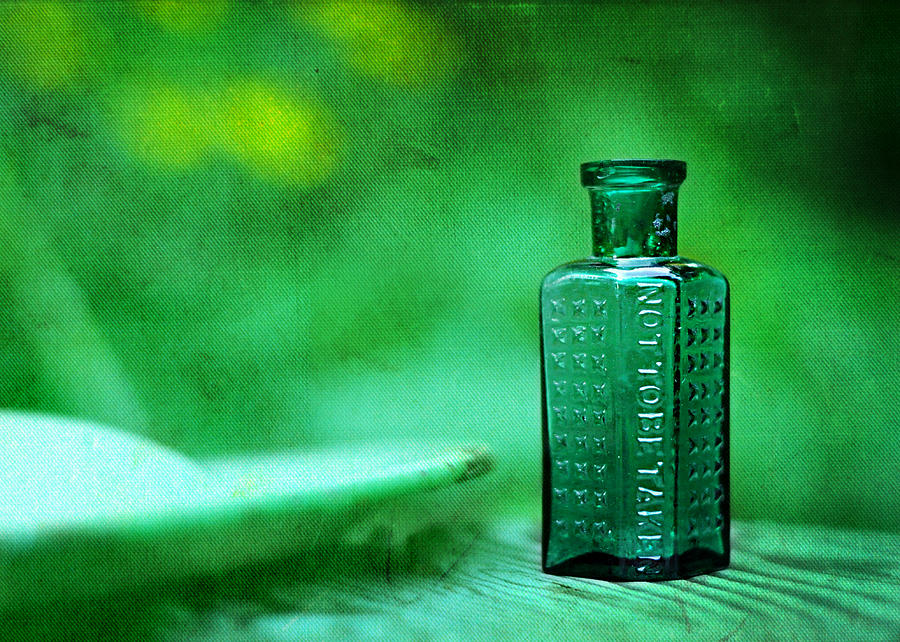 Small Green Poison Bottle Photograph by Rebecca Sherman