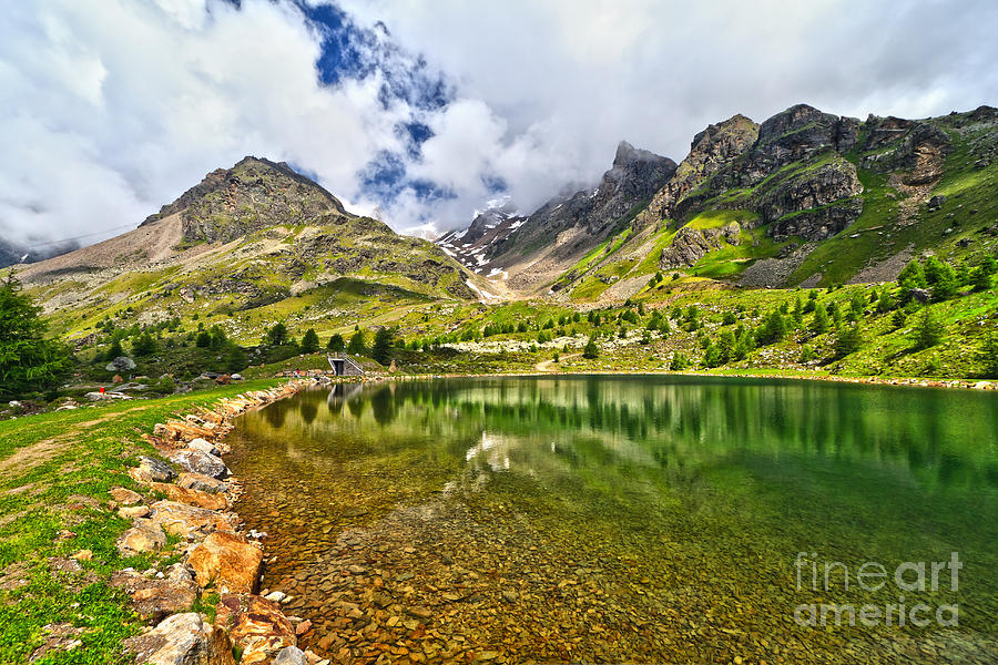 small lake in Pejo Valley Photograph by Antonio Scarpi