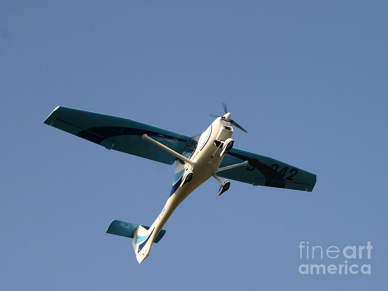 Small plane in the air Photograph by Susanne Baumann