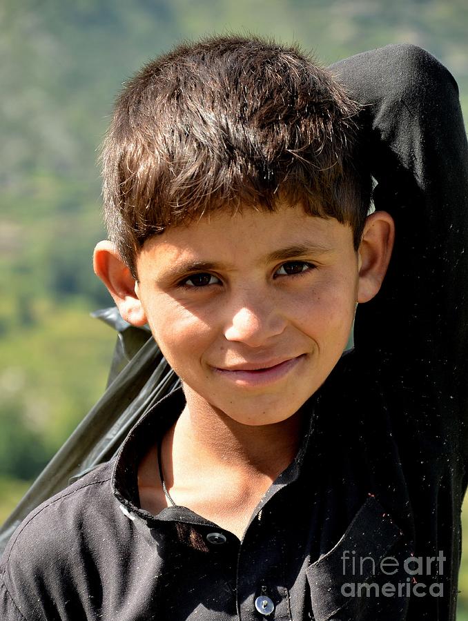 Smiling boy in the Swat Valley - Pakistan Photograph by Imran Ahmed