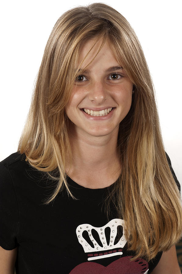 Smiling Teenage Girl Photograph by Juanmonino