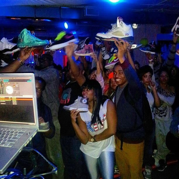 Sneakers In The Air... Sole Glow Photograph by Dj Skinny