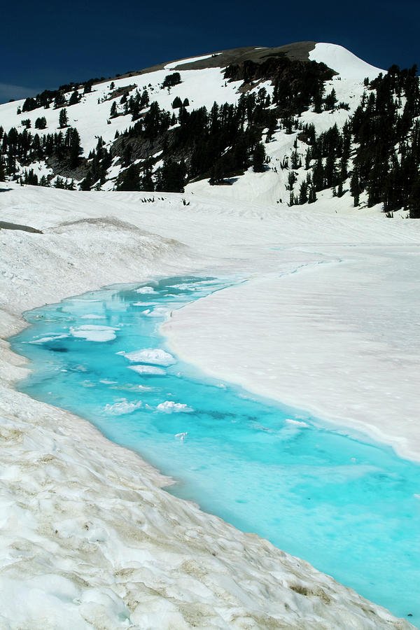Snow And Ice Beginning To Melt On Edge Photograph by Emily Riddell