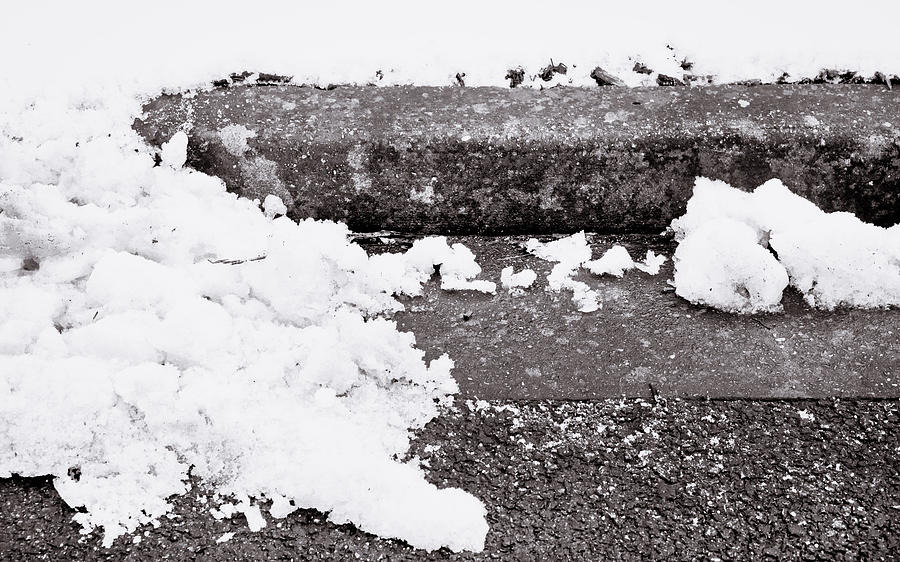 Black And White Photograph - Snow by the kerb by Tom Gowanlock