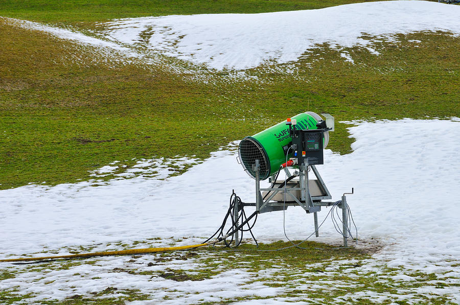 Snow cannon on meadow with little snow Photograph by Matthias Hauser