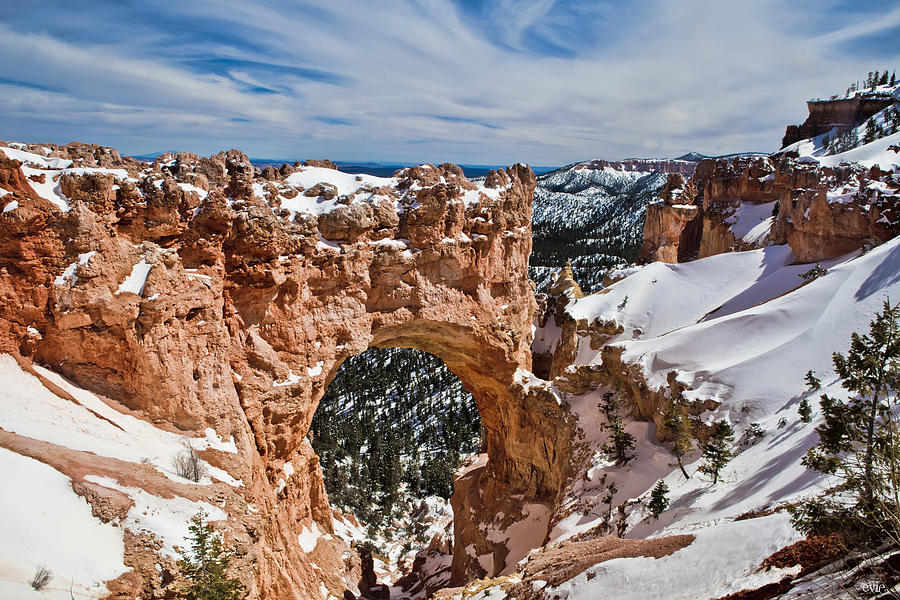 Snow Capped Arch at Bryce Photograph by Evie Carrier