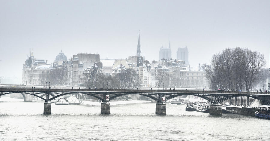 Snow Covered Bridge In Paris Photograph by Martial Colomb