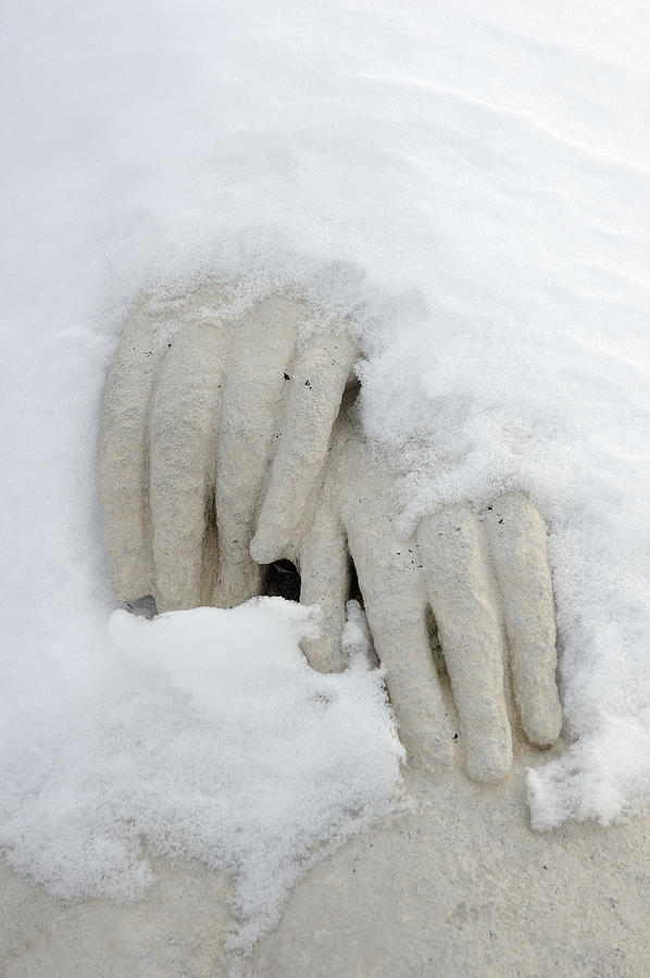 Snow covered hands of a statue Photograph by Matthias Hauser