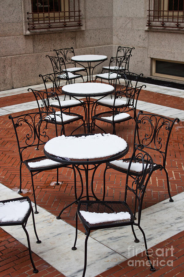 Snow covered patio chairs and tables Photograph by Thomas Marchessault