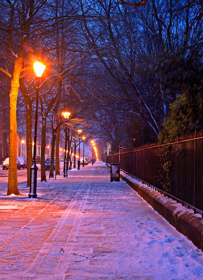 Snow covered urban street at nightime in mid winter Photograph by Ken ...