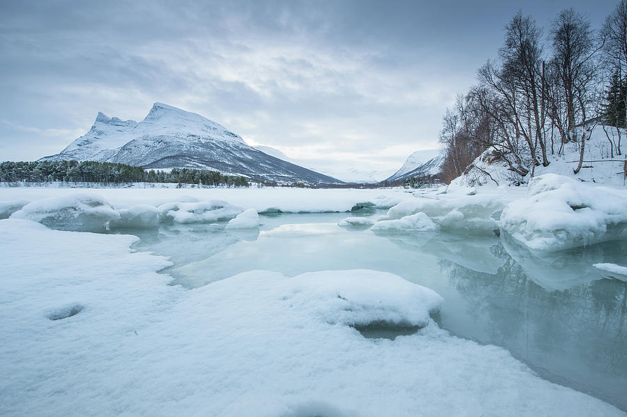 Snow Land With Clod Water Photograph by Coolbiere Photograph