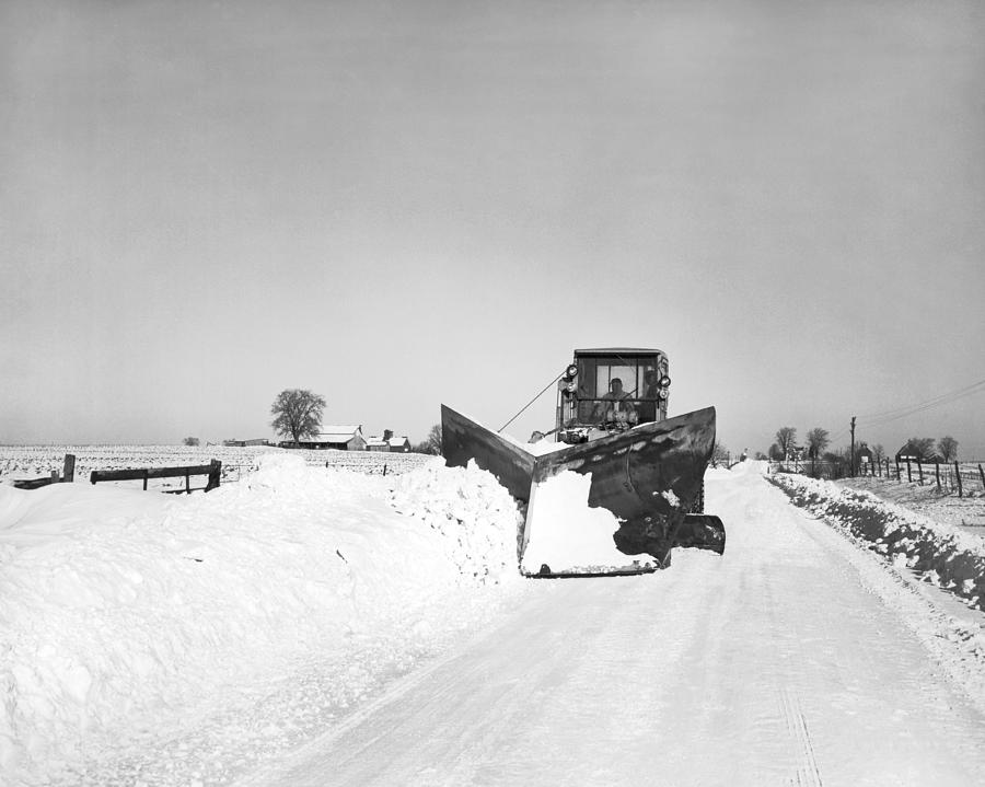 Black And White Photograph - Snow Plow Clearing Roads by Underwood Archives