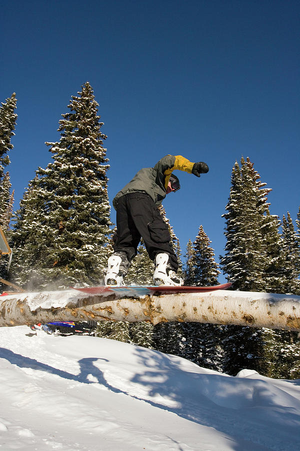 Snowboarding On A Rail Photograph by J.C. Leacock - Fine Art America