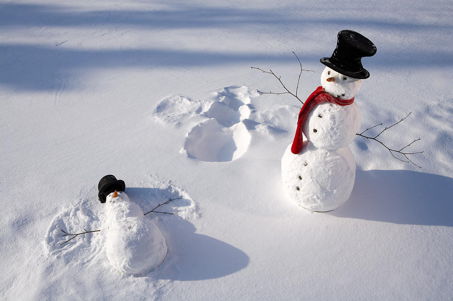Carrot Photograph - Snowmen In Forest Making Snow Angel by Kevin Smith