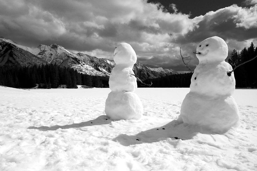 Snowmen on Johnson Lake Photograph by Daniel Woodrum