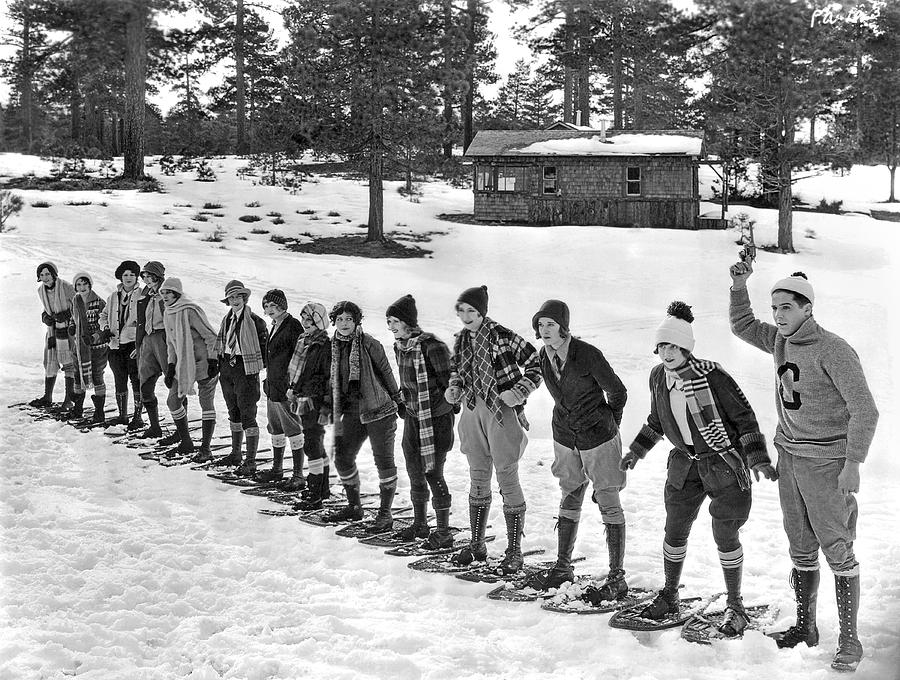 Black And White Photograph - Snowshoe Race In The Mountains by Underwood Archives