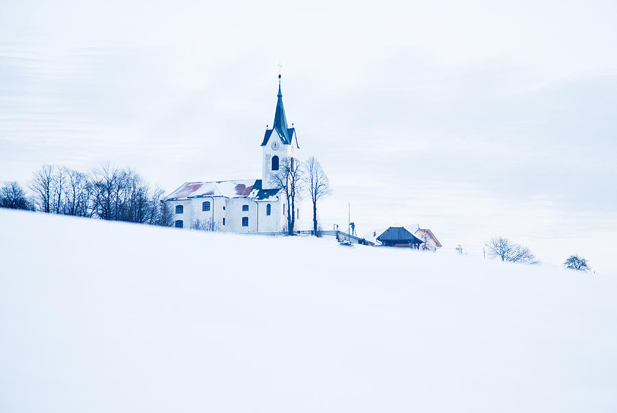Snowy church Photograph by Ian Middleton