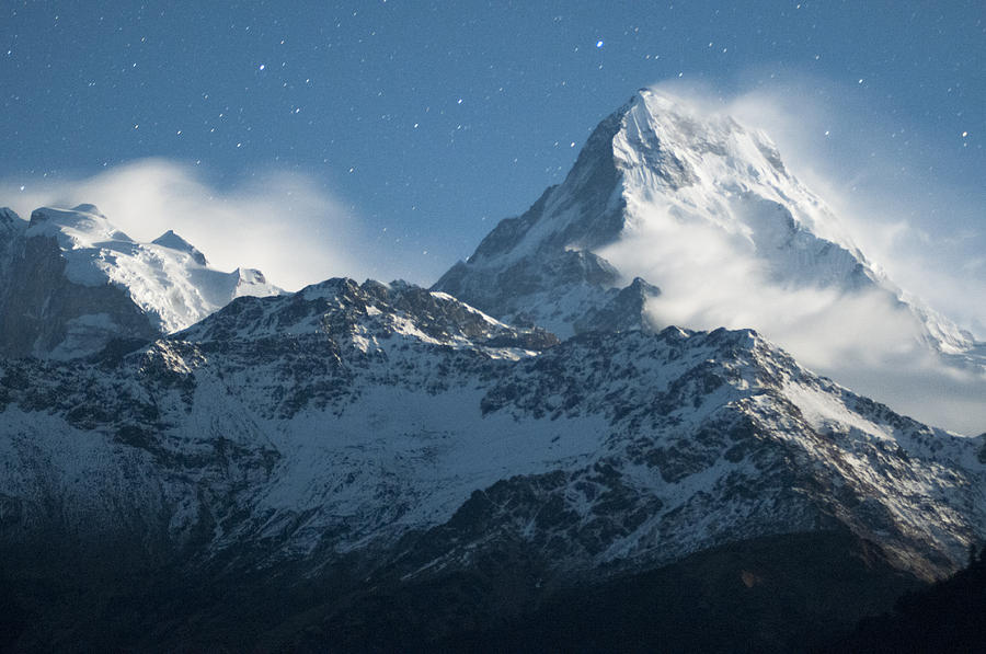 Snowy peak under starlit sky Photograph by Yifei Fang
