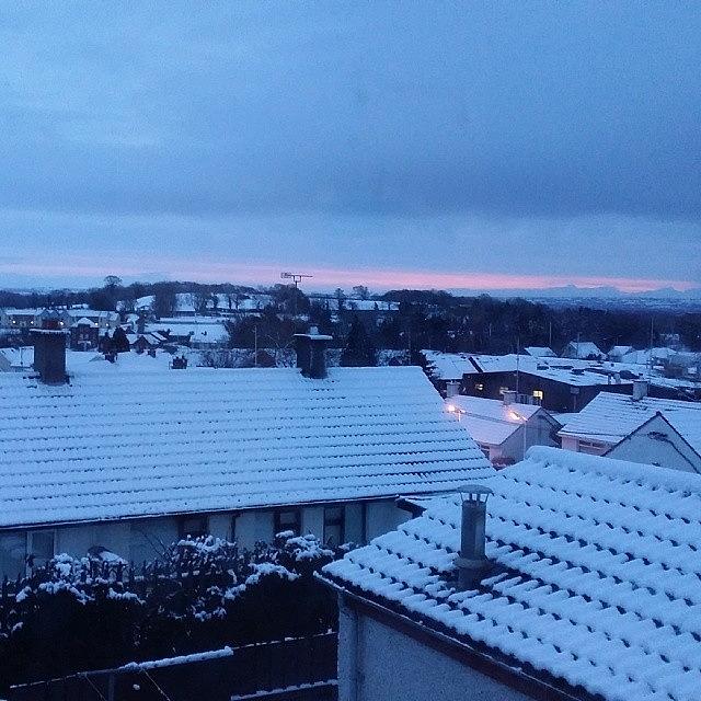 Snowy Rooftops And Tequila Sunrise Photograph by Mary Ohagan
