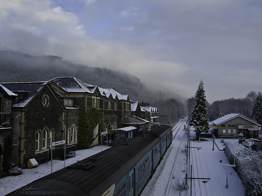Snowy train station Photograph by B Cash