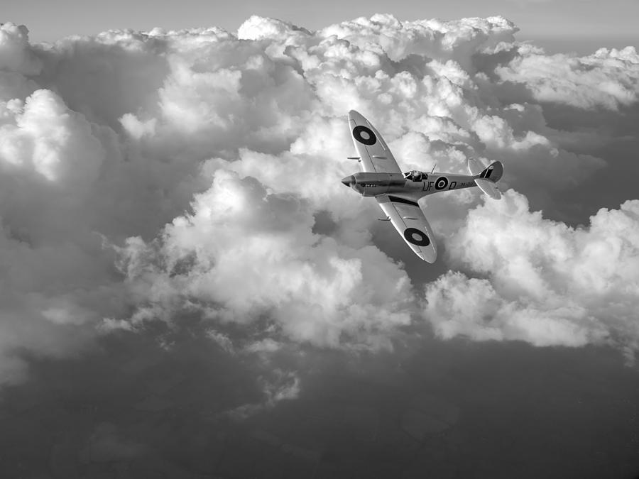 Soaring silver Spitfire cloudscape black and white version Photograph by Gary Eason