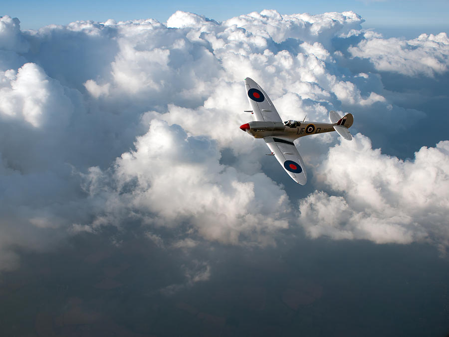 Soaring silver Spitfire cloudscape Photograph by Gary Eason
