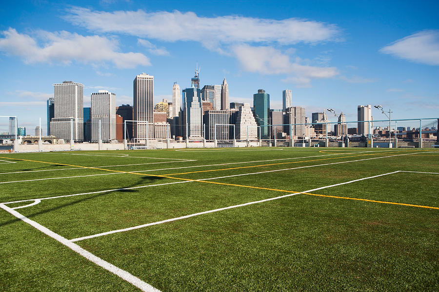 Soccer fields and Lower Manhattan skyline, New York City, USA Photograph by Ditto