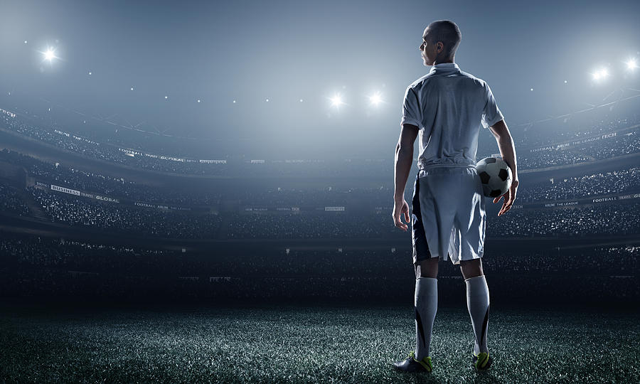 Soccer player in stadium Photograph by Dmytro Aksonov