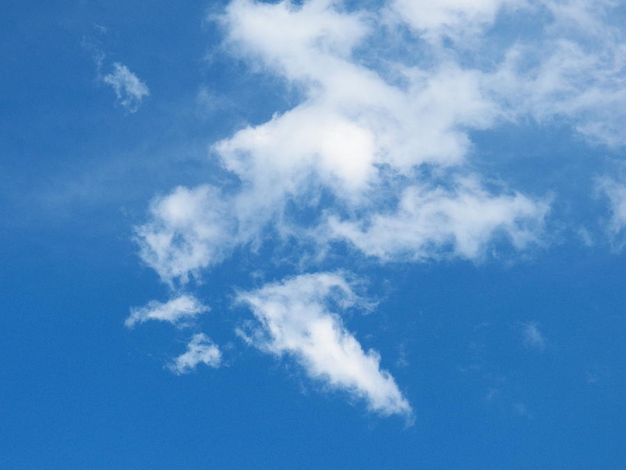 Soft Clouds on Blue Photograph by Corinne Elizabeth Cowherd