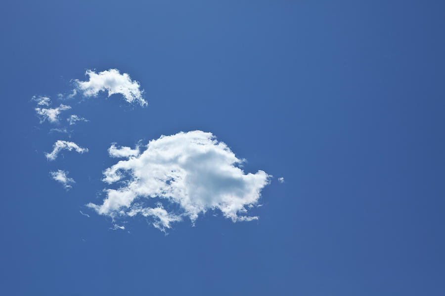 Soft White Clouds On A Blue Sky Photograph by Ursula Alter