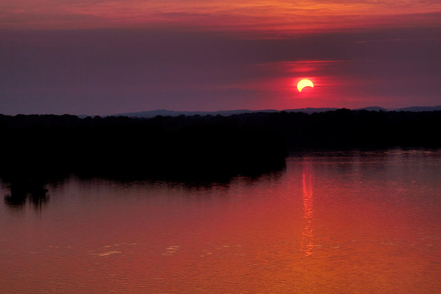 Solar Eclipse Sunset Photograph by Jason Politte
