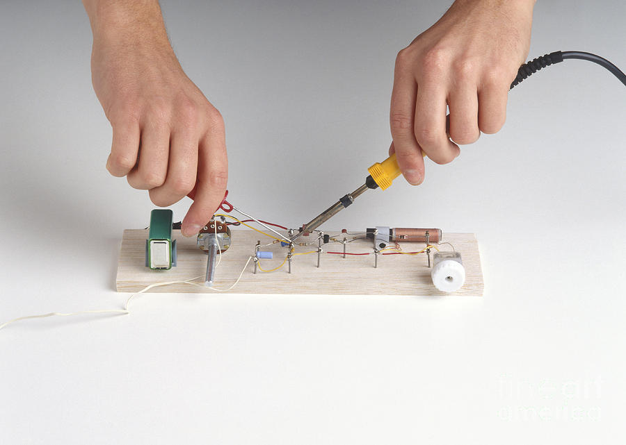 Soldering Electrical Components Photograph by Dorling Kindersley