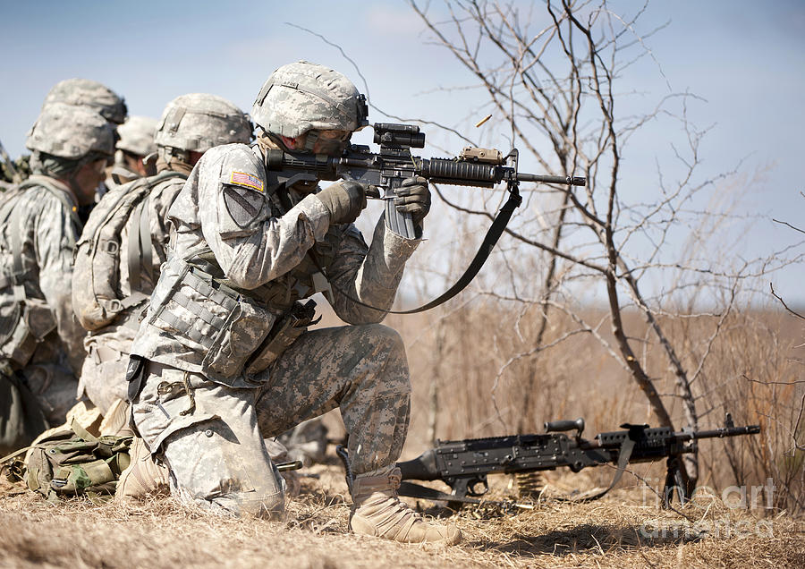 Soldier Fires His Rifle At A Target Photograph by Stocktrek Images ...