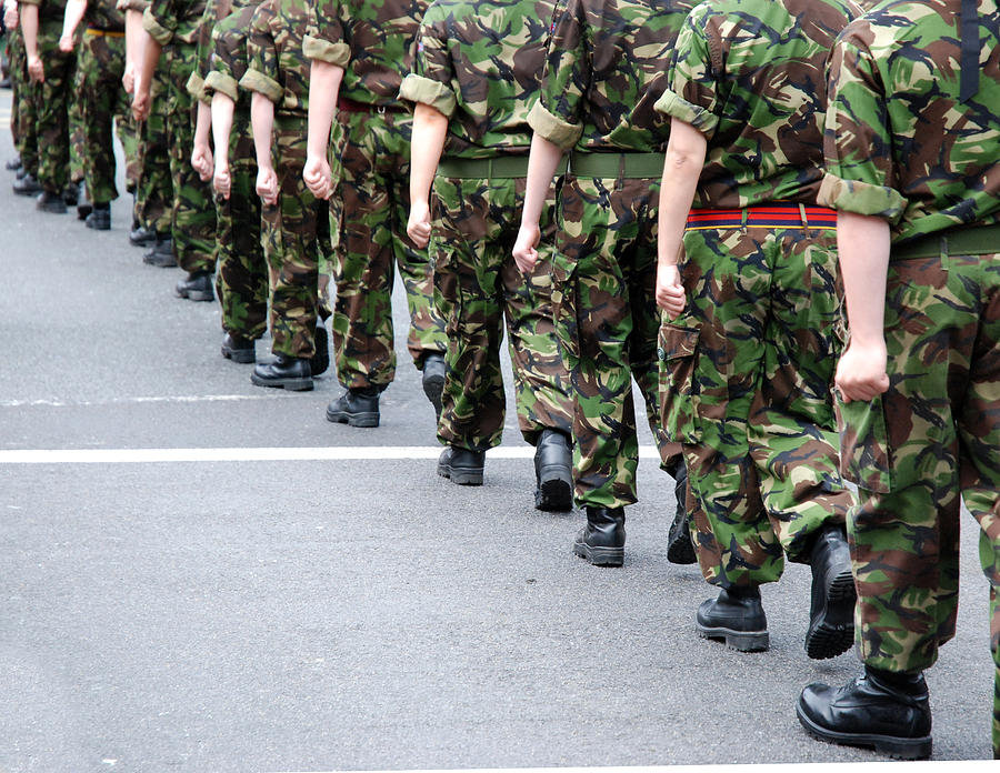 Soldiers marching Photograph by Ilbusca