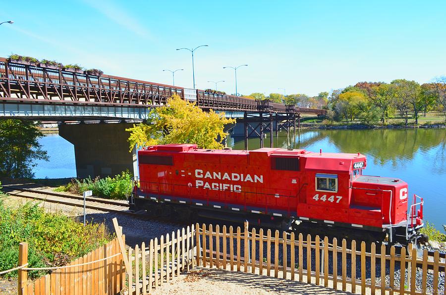 Solo Red Canadian Pacific Engine along Rock River in Rockford Photograph by Jeff at JSJ Photography