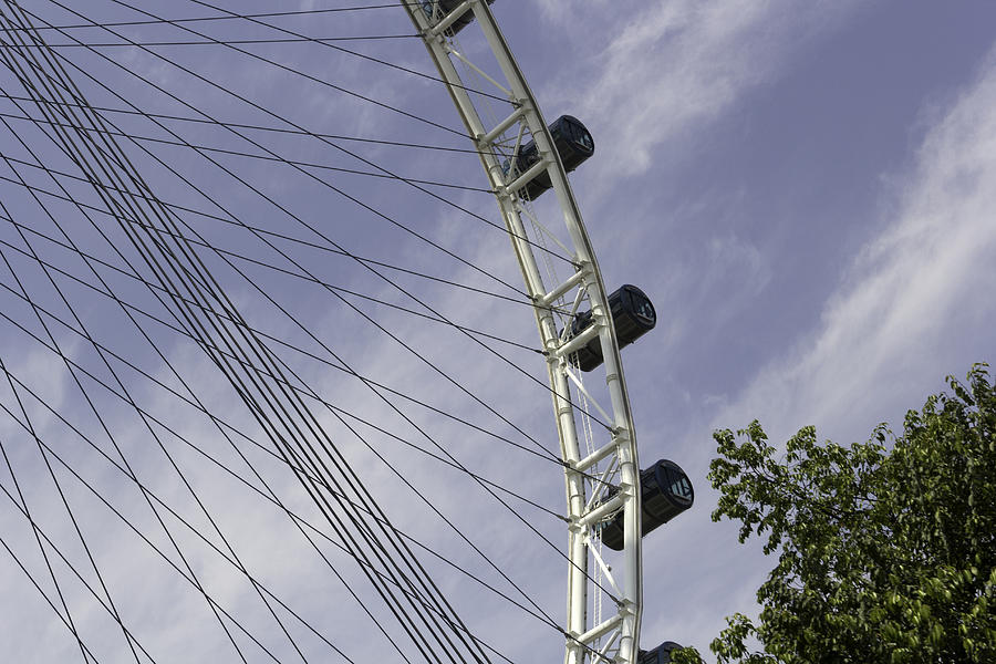 Some capsules of the Singapore Flyer along with the spokes Photograph by Ashish Agarwal