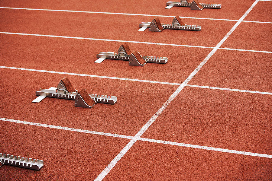 Some starting block on running track Photograph by Tomazl