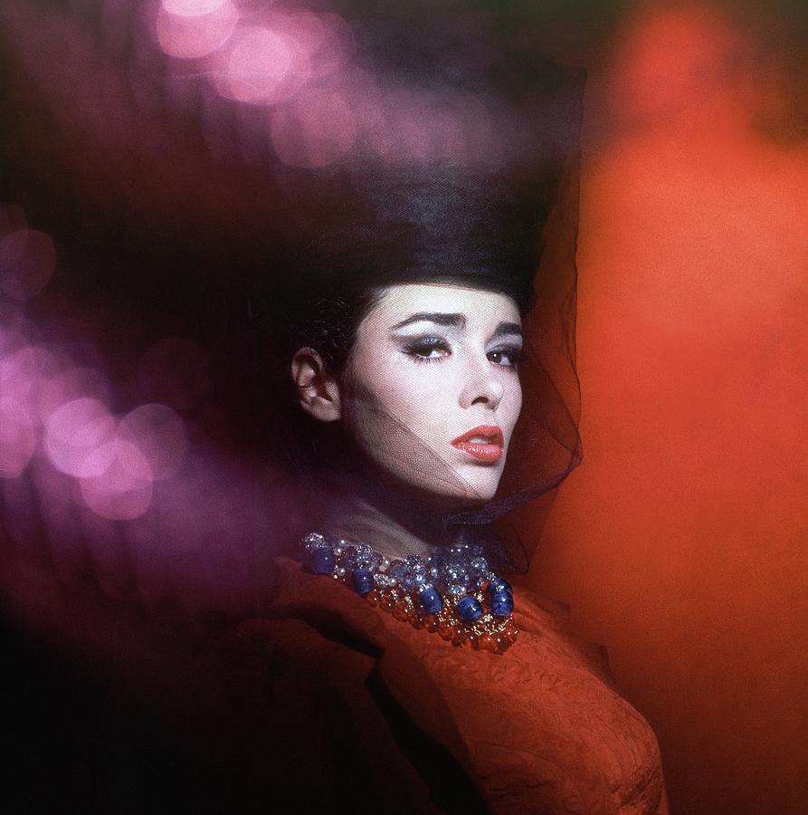 Sondra Peterson Wearing Beaded Necklace Photograph by Horst P. Horst