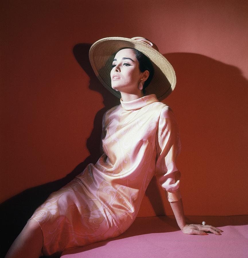 Sondra Peterson Wearing Pink Dress And Straw Hat Photograph by Horst P. Horst