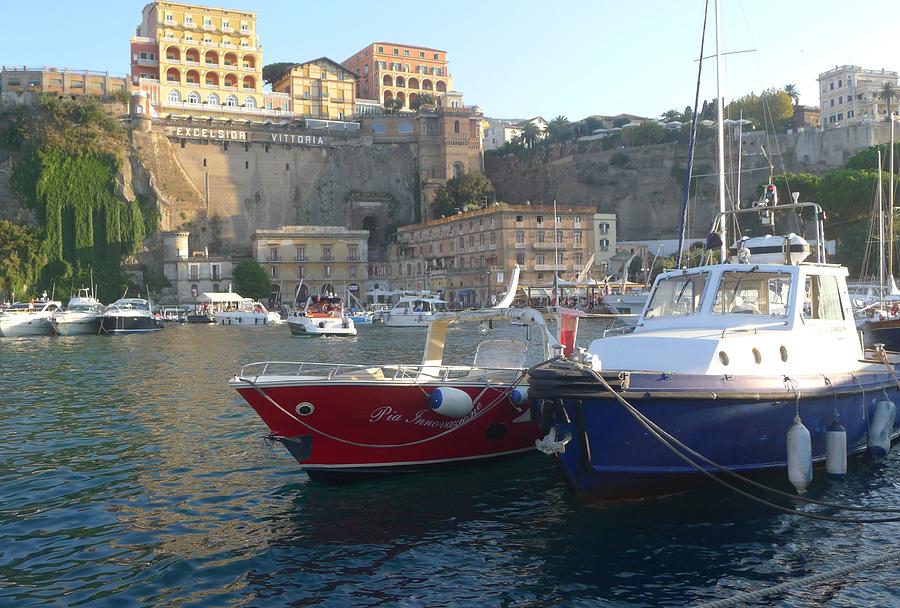 Sorrento - red and blue boats  Photograph by Nora Boghossian