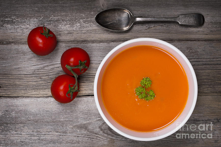 Tomato Photograph - Soup on wood table by Jane Rix